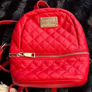 Red Bebe backpack in new condition, priced to sell!